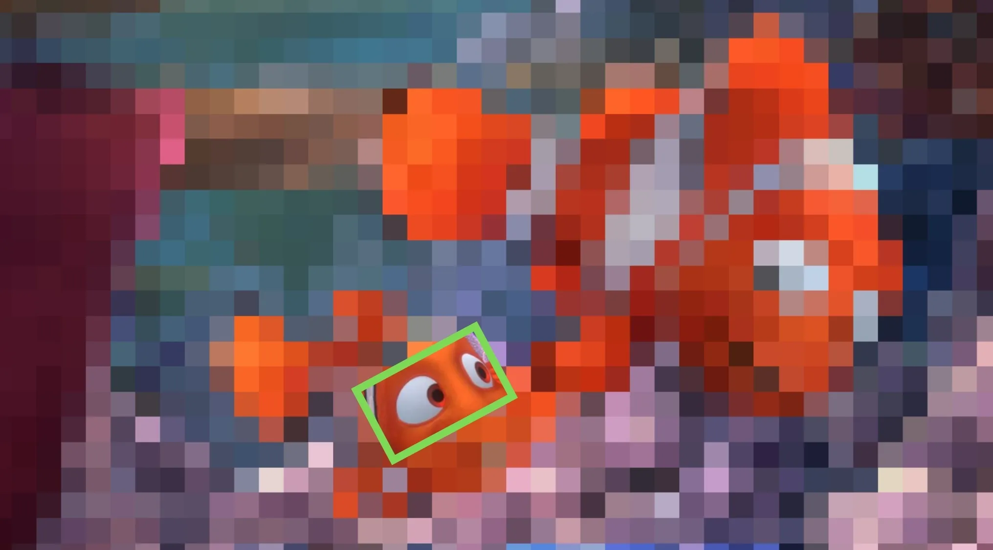 Close-up of Disney characters' eyes on an orange clownfish from the animated movie Finding Nemo.