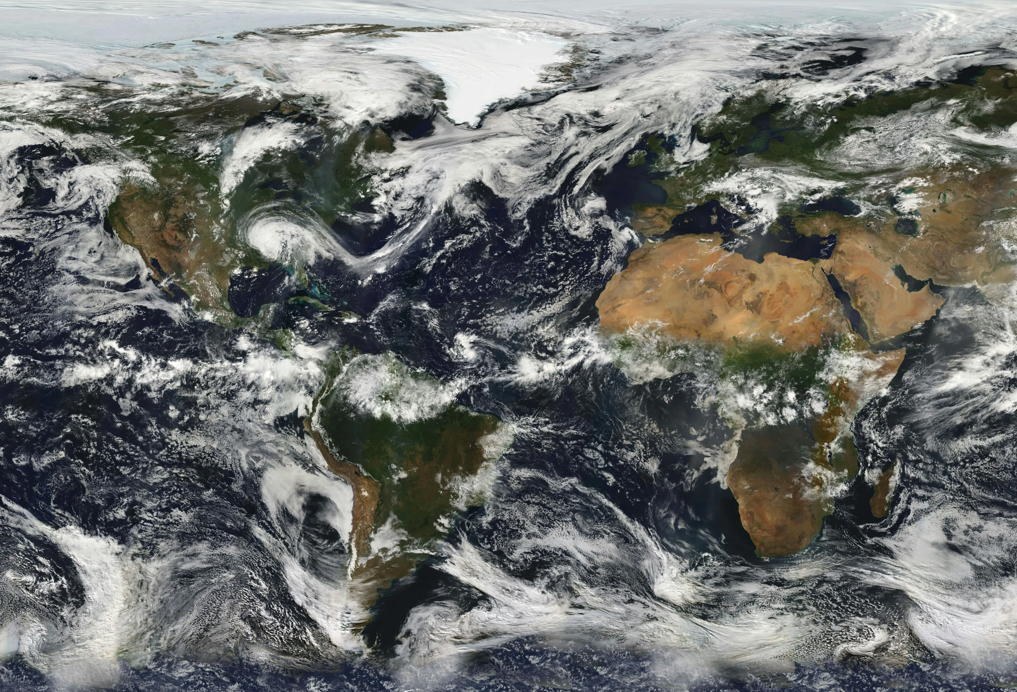 Satellite image of Earth showing global geography highlighting key waterways like the Istanbul Strait, Suez Canal, and Panama Canal.