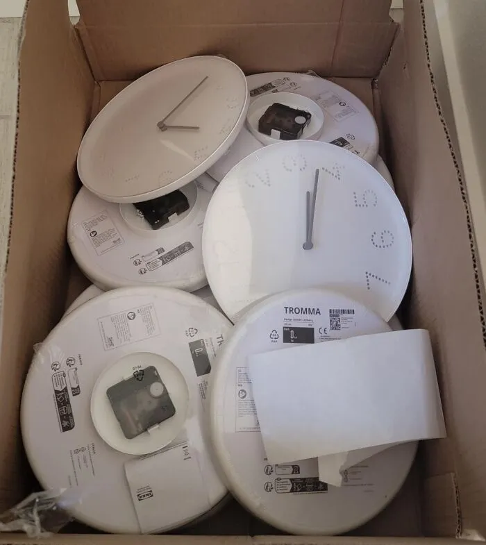 Ordered A Storage Bin From IKEA, Received A Dozen Loosely Packed Wall Clocks Instead