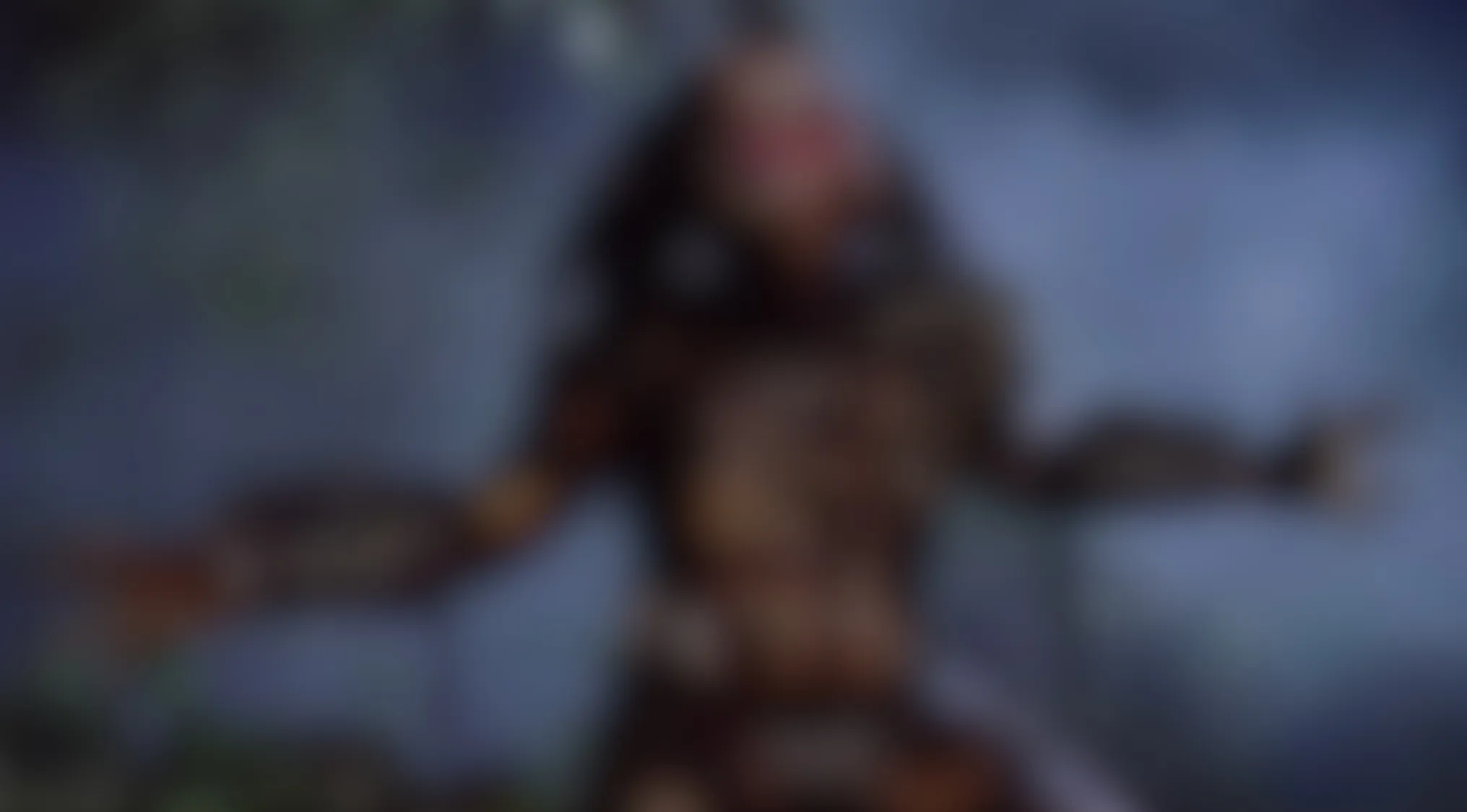 A blurry movie scene depicting a figure resembling Predator with arms wide, red on its face, in a dark, atmospheric setting.