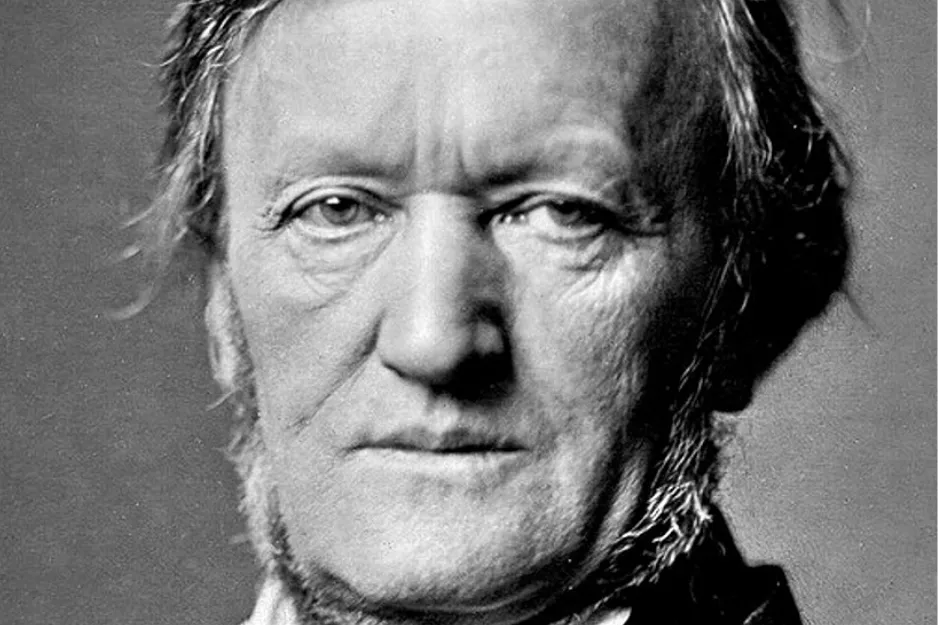 Black and white close-up of composer Richard Wagner, who composed Il Trovatore, with a serious expression.