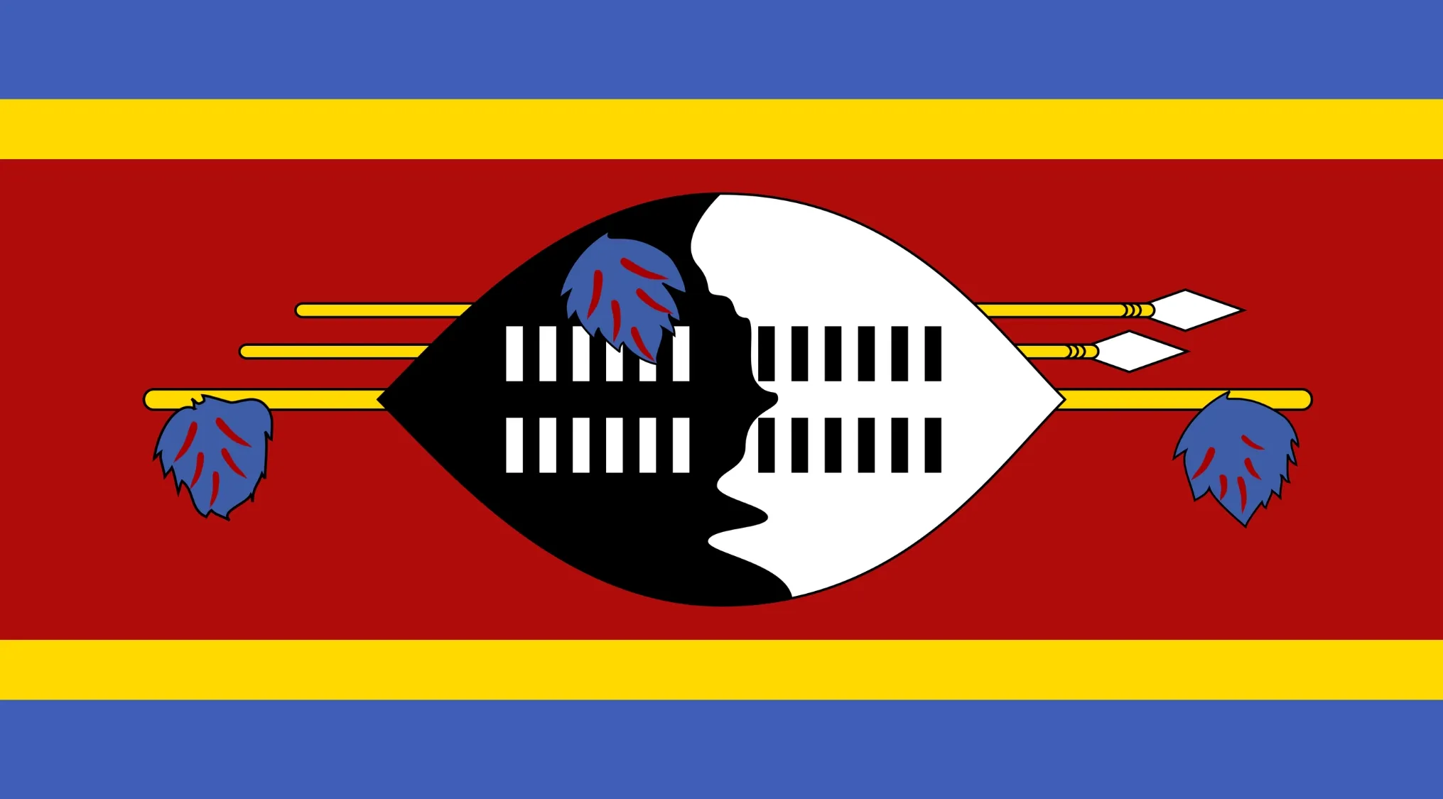 Vibrant flag of Eswatini featuring blue, yellow, red stripes and a central black and white shield with spears. Guess The Country from this visual hint.