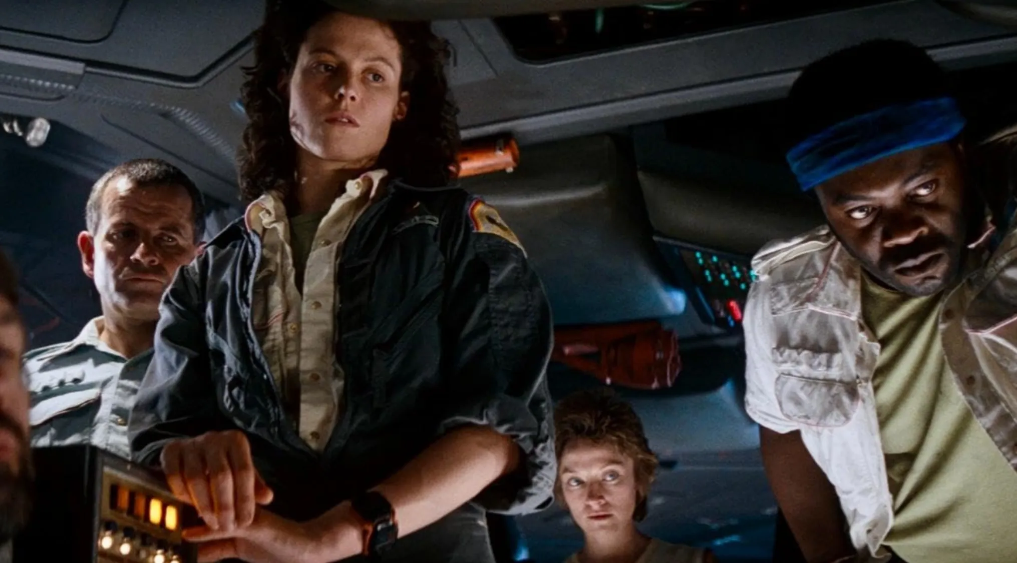 Ripley and crew from Alien (1979), a classic sci-fi horror movie. Horror movie trivia for fans.