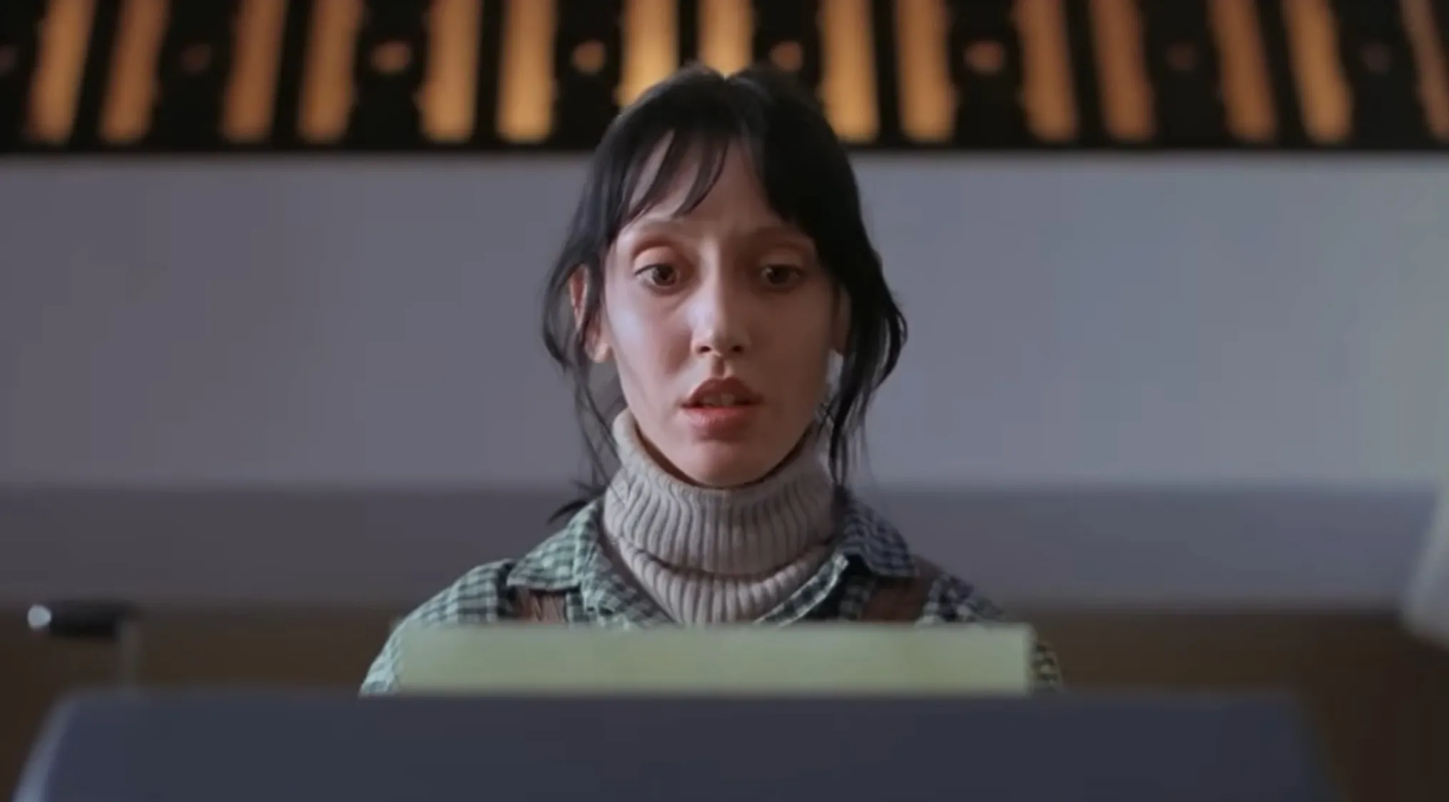 Wendy Torrance's shocked face, discovering the repeated phrase in Jack Torrance's manuscript in The Shining. Horror movie trivia.