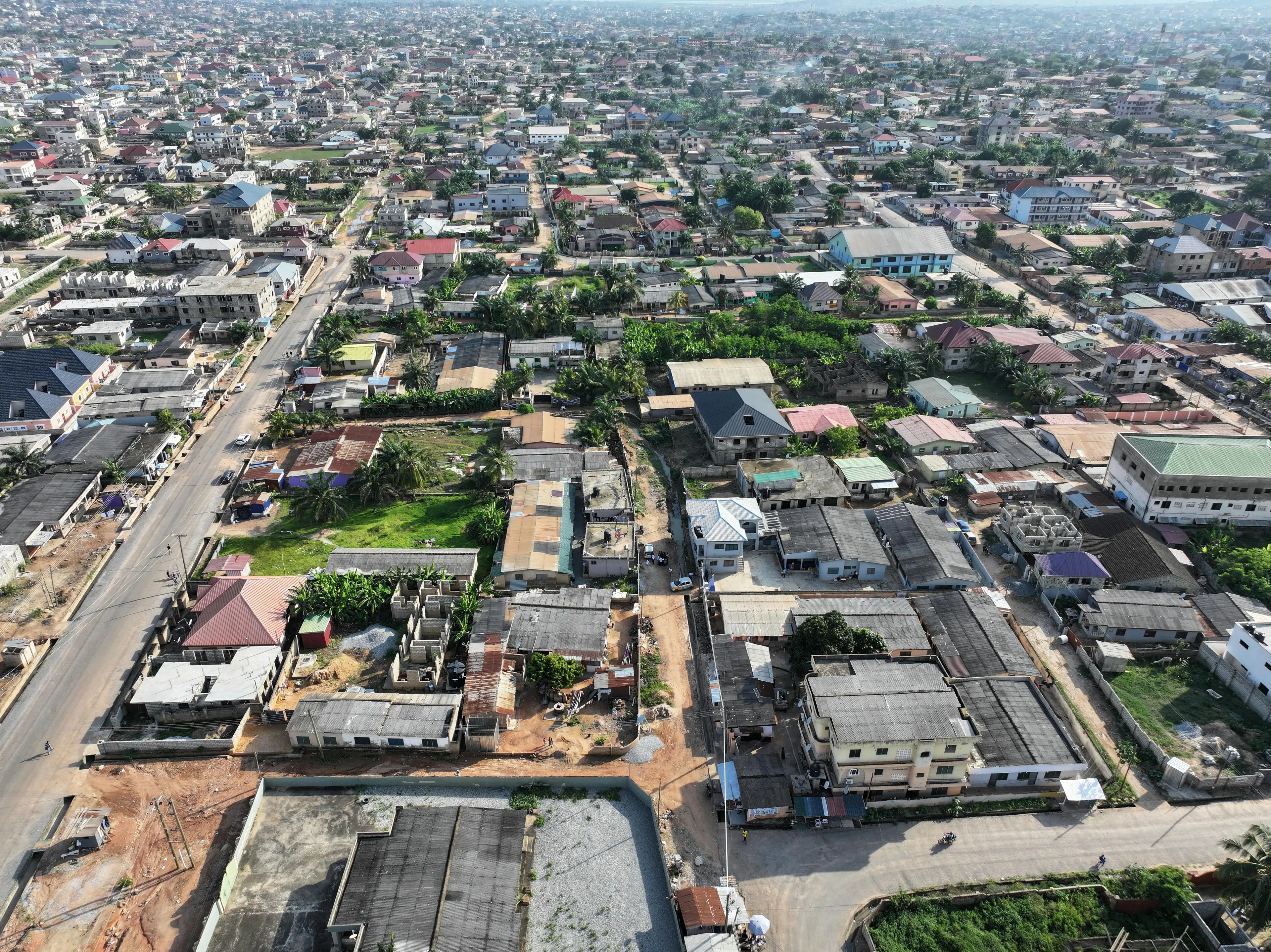 Aerial view of a city with many buildings and streets, testing trivia night questions about the capital city of Ghana.