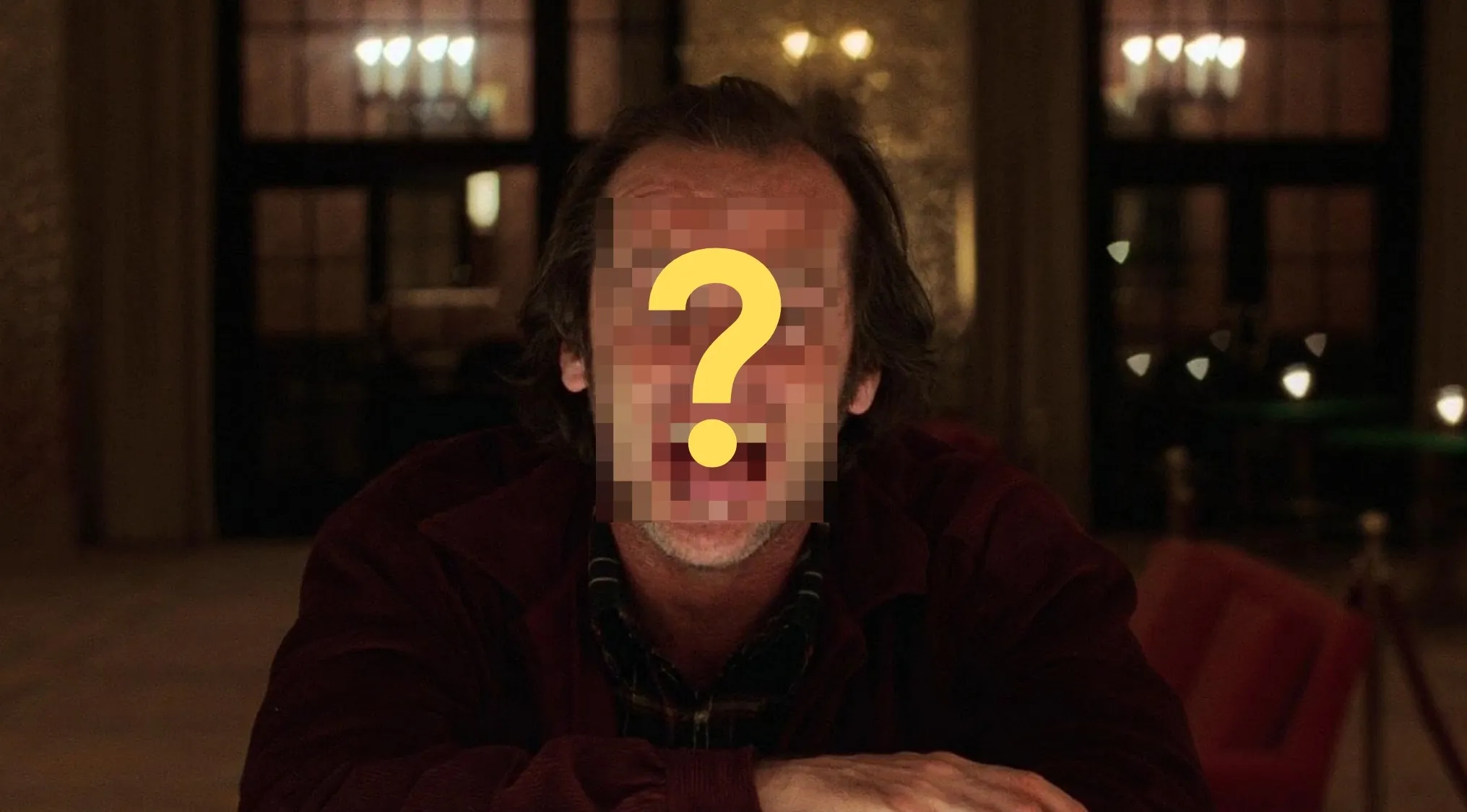 A man with a pixelated face and a question mark, resembling Jack Torrance from The Shining, in a movie quiz.