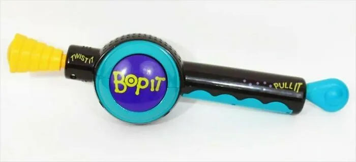 A colorful Bop It game device, a nostalgic toy from childhood, makes people take a trip down memory lane.