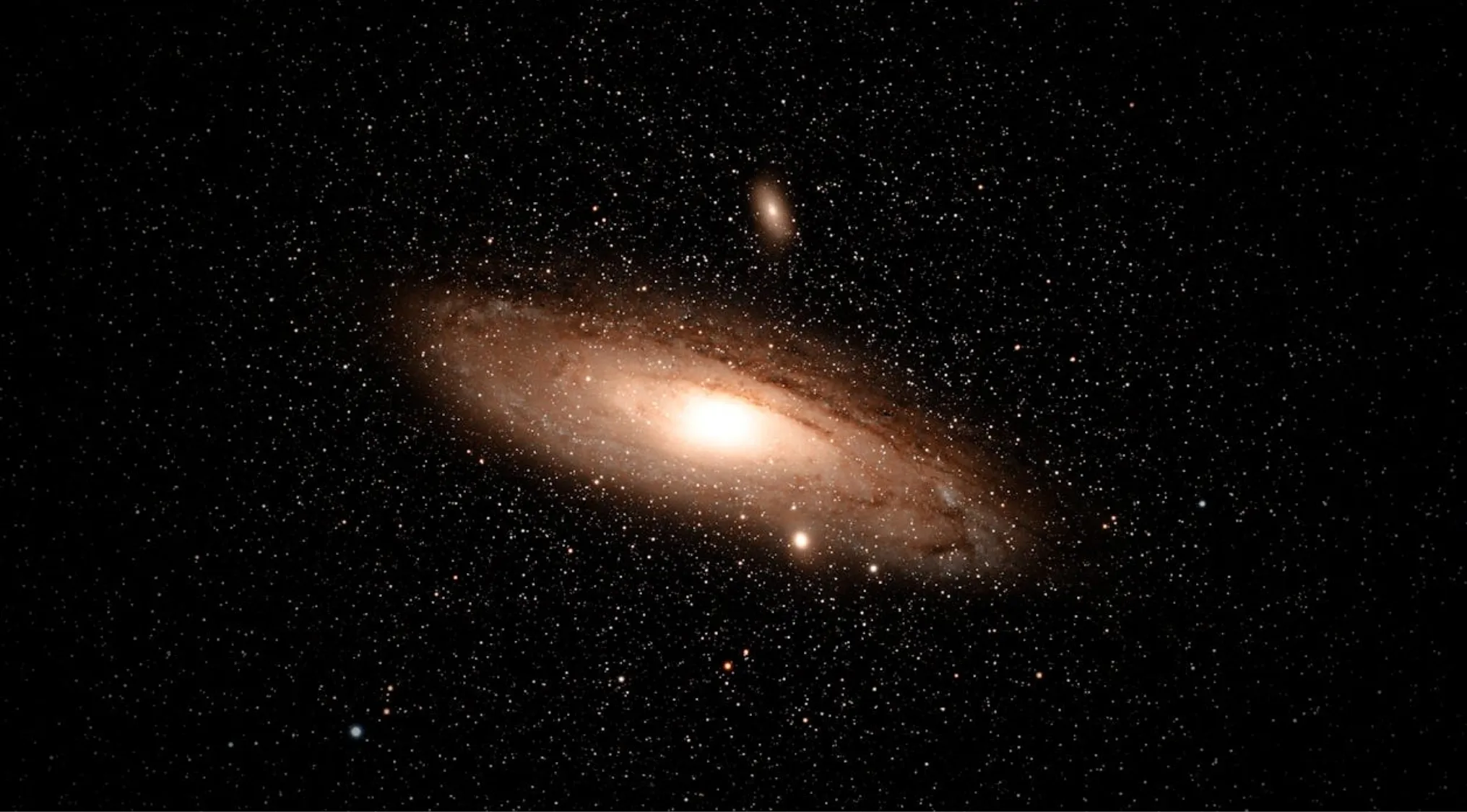 A luminous spiral galaxy, the Andromeda Galaxy, against a dark, star-filled background. General Knowledge about the Big Bang theory.