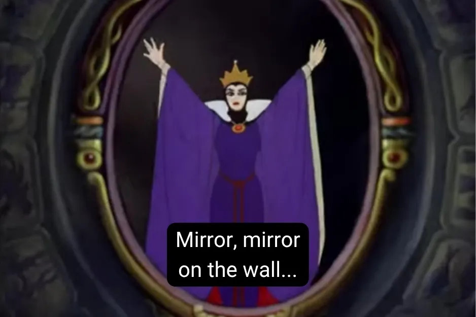 The Evil Queen, in her reflection, asks, "Mirror, mirror on the wall..." in a classic scene.