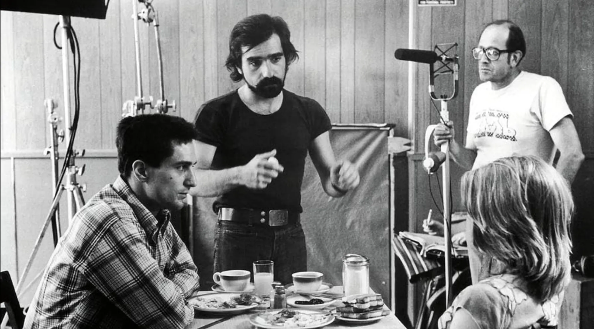 Guess the movie from this BTS moment: Robert De Niro, Martin Scorsese, and crew on set, filming a breakfast scene.