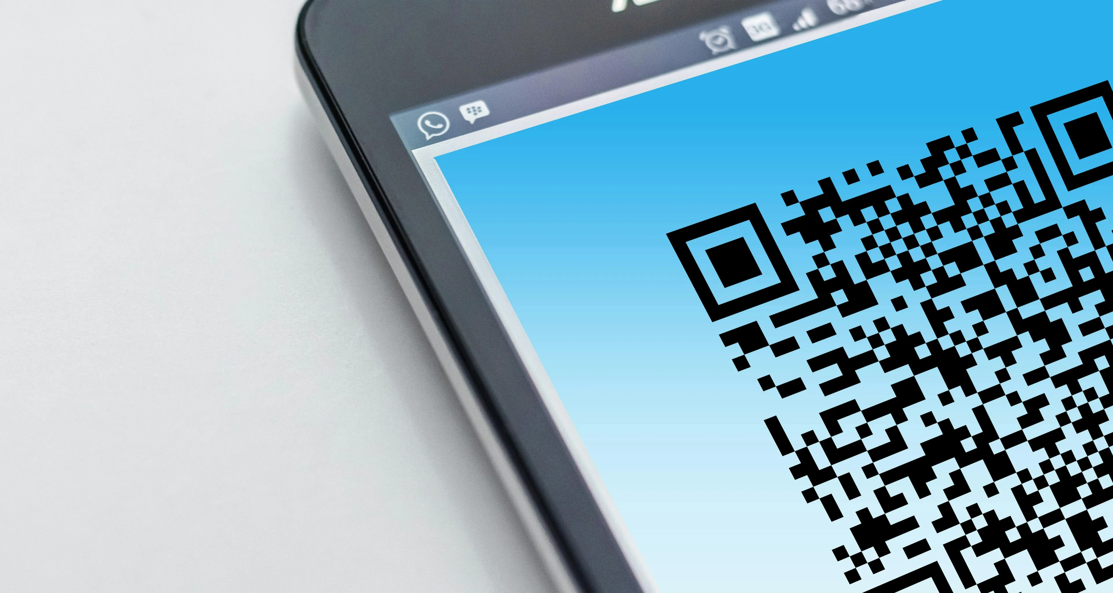 A smartphone displaying a QR code on its screen, essential for understanding general knowledge on QR codes.