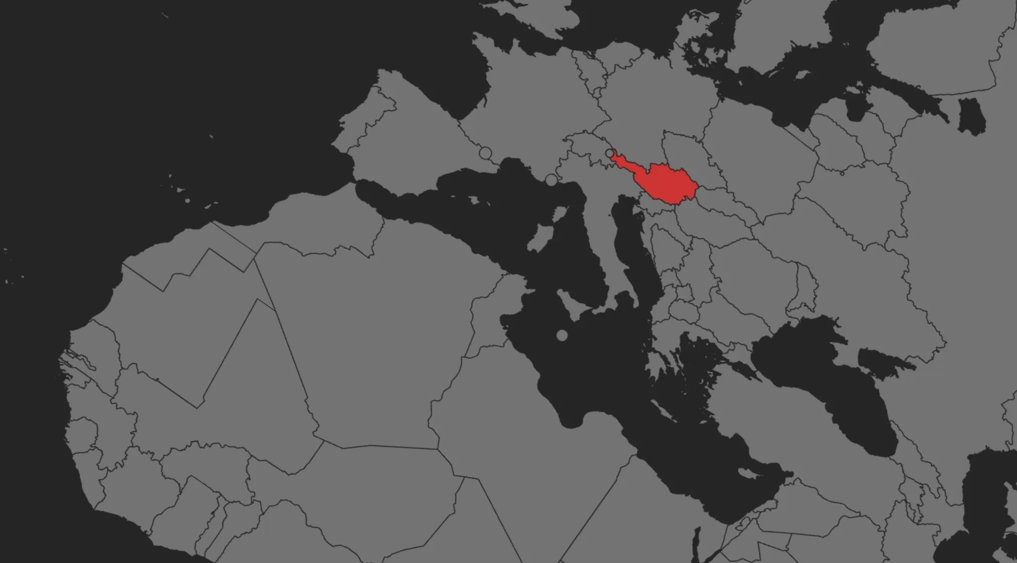 A gray map of Europe and Africa with a red-highlighted country, guessing the country for a Geography Challenge.