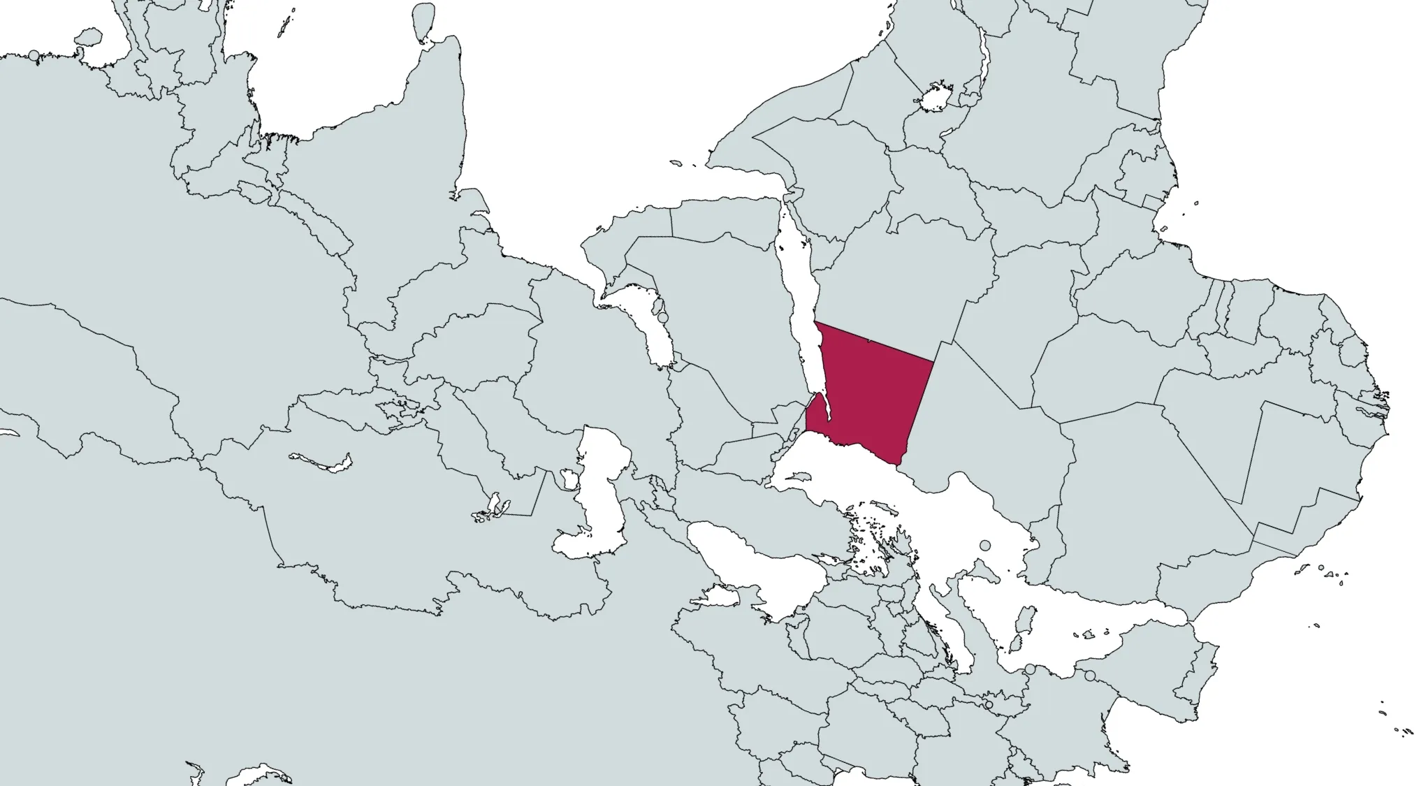 A gray world map with one country highlighted in red, part of a Guess the country from the crazy map challenge.
