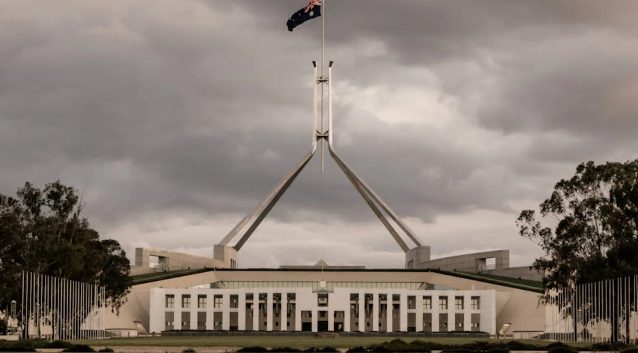 Australian Citizenship: Part 2. A diverse group of Australian Members of Parliament in session, illustrating the number of MPs in the House.