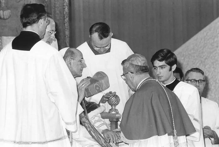 Black and white photo of a religious ceremony with priests, illustrating what was happening in the year you were born.