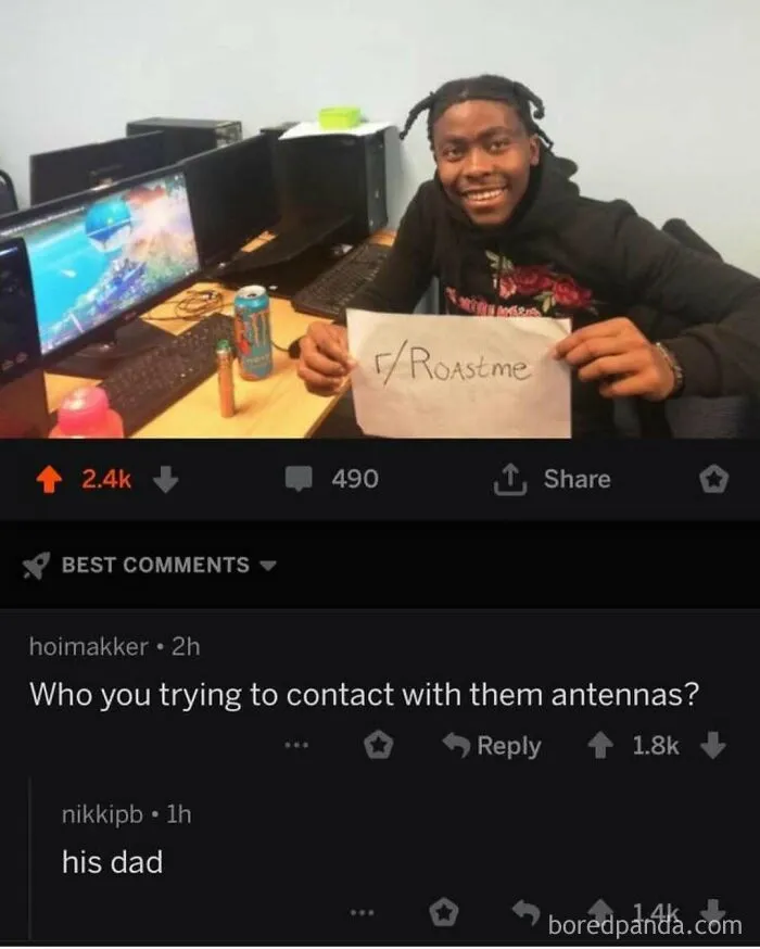 A smiling person holding a r/Roastme sign with a viral comment: "Who you trying to contact with them antennas? his dad." A rare burn.