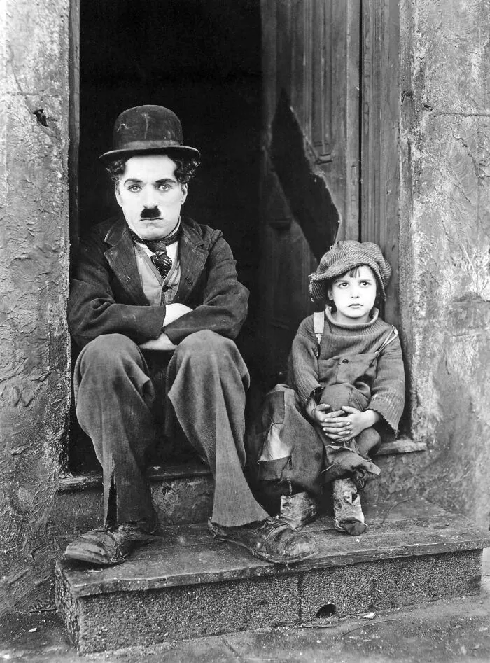 Publicity Photo From Charlie Chaplin's 1921 Movie The Kid. Pictured Are Charlie Chaplin And Jackie Coogan, 1921