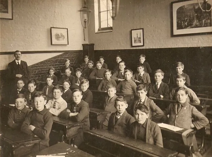 Interior Of A School Classroom In England, Boys With Their Teacher. Thought To Be In The South Of England, 1920s