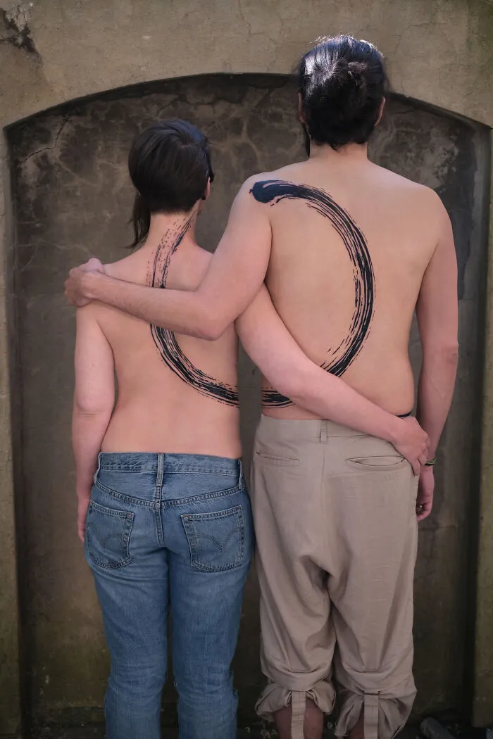 These 15 Couple Tattoos Blur The Line Between Two Individuals And One Design