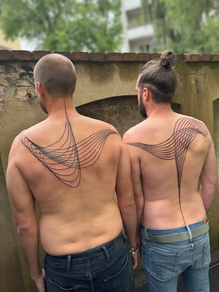These 15 Couple Tattoos Blur The Line Between Two Individuals And One Design