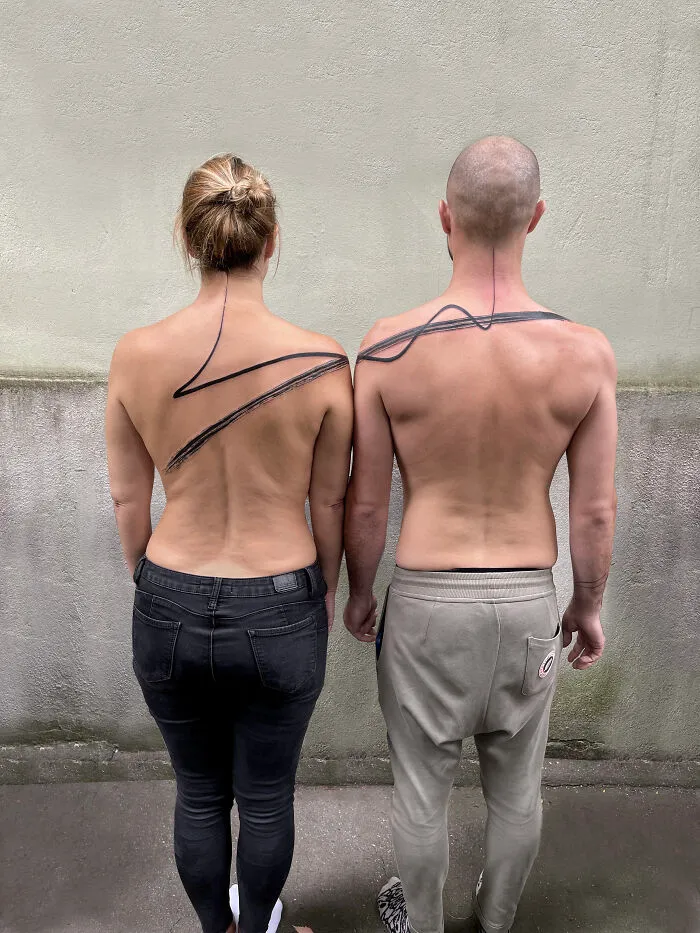 These 15 Couple Tattoos Blur The Line Between Two Individuals And One Design