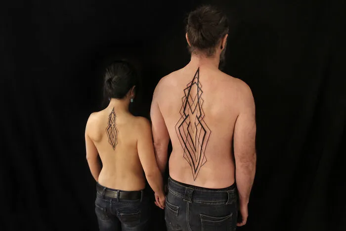 These 15 Couple Tattoos Blur The Line Between Two Individuals And One Design
