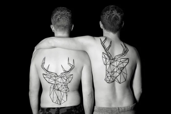 These 15 Couple Tattoos Blur The Line Between Two Individuals And One Design