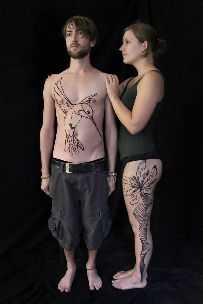These 15 Couple Tattoos Blur The Line Between Two Individuals And One Design