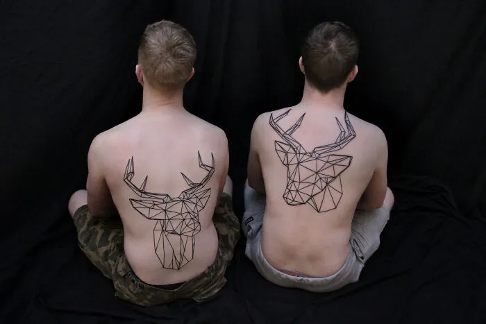 These 15 Couple Tattoos Blur The Line Between Two Individuals And One Design