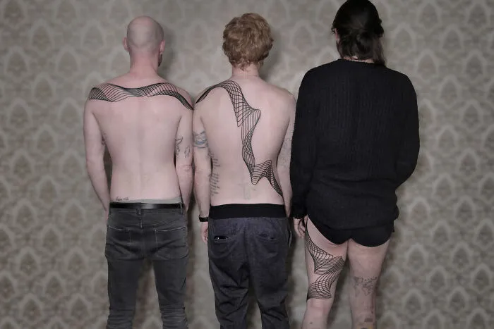 These 15 Couple Tattoos Blur The Line Between Two Individuals And One Design