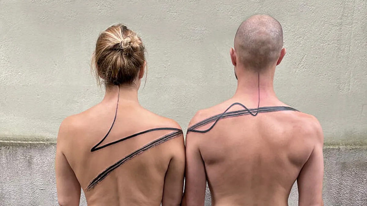 These 15 Couple Tattoos Blur The Line Between Two Individuals And One Design