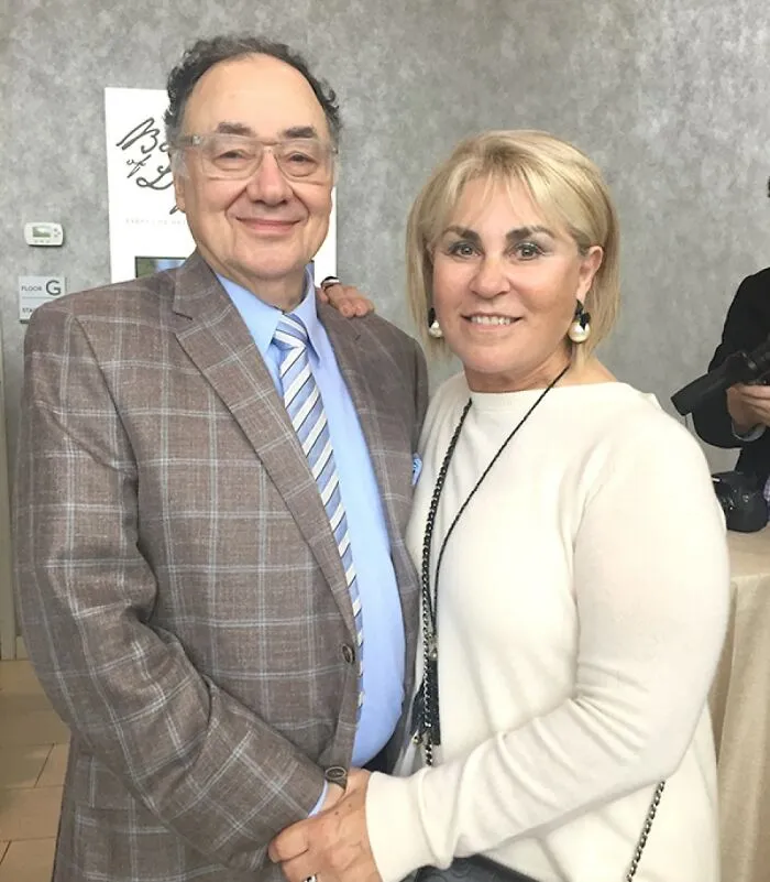 Older man and woman posing together indoors, representing creepy and mysterious things people lose sleep over.