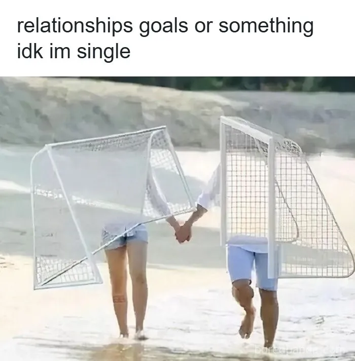 Couple holding hands with soccer goals on their bodies, illustrating memes that show funny relationship goals.