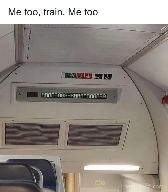 Train interior with a digital sign displaying multiple A's, highlighting memes as a reason people pay for the internet.
