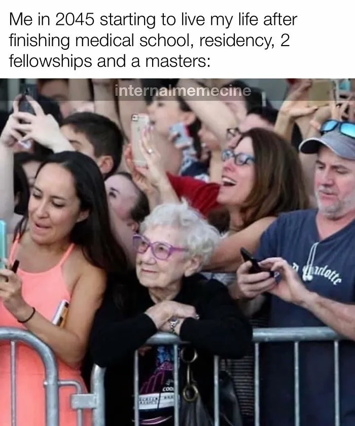 Medical meme showing a crowd with an elderly woman looking content, illustrating the long journey to becoming a doctor.