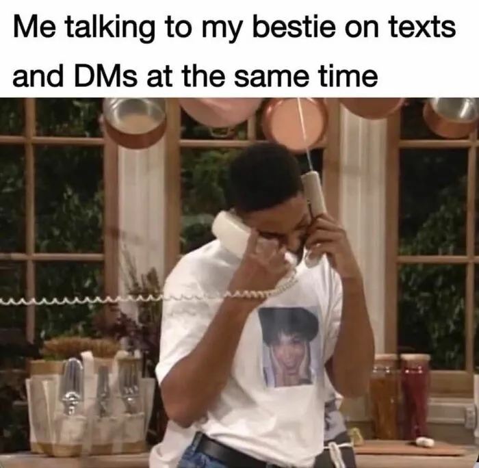 Man holding two phones talking to bestie meme