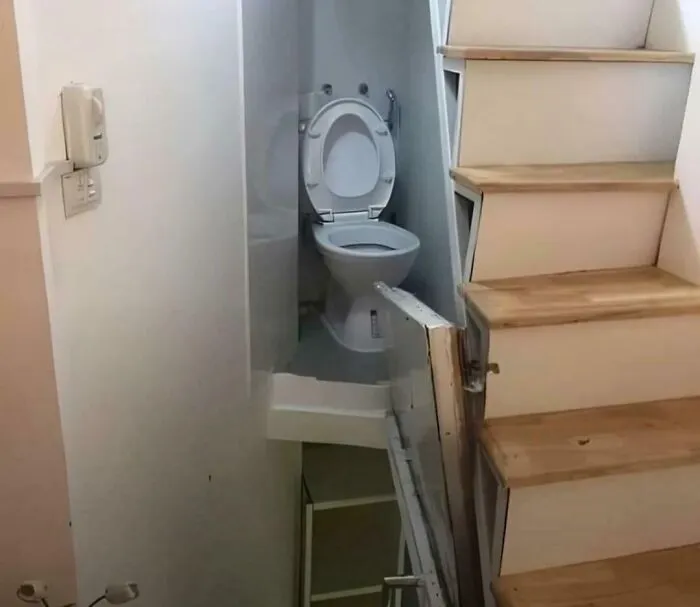 Hideaway Bathroom Behind Stairwell