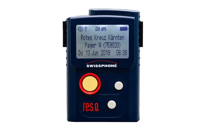 A close-up of a blue Swissphone res.Q pager on a white background, displaying a retro gadget for revival.