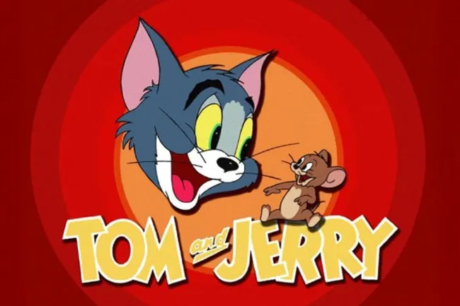 Tom and Jerry title card on a red background. Tom, a grey cat, smiles widely while Jerry, a small brown mouse, looks mischievous.