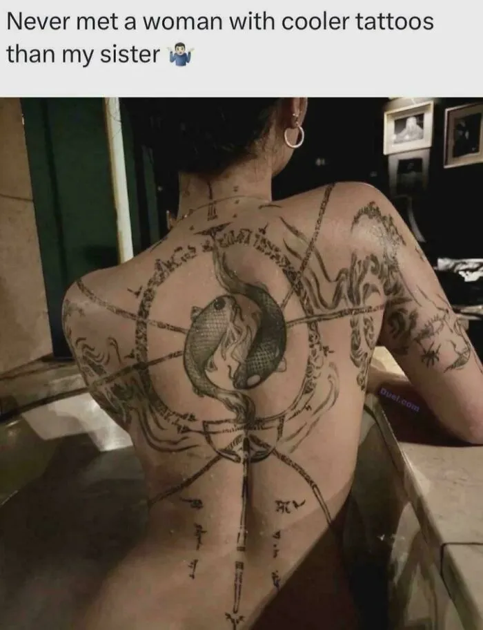 Promeia And The Yin Yang Fish Tattoo