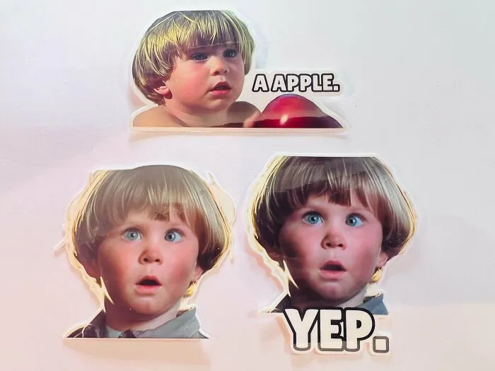 Three stickers of a 90s kid meme featuring a child looking surprised, with text A APPLE and YEP.