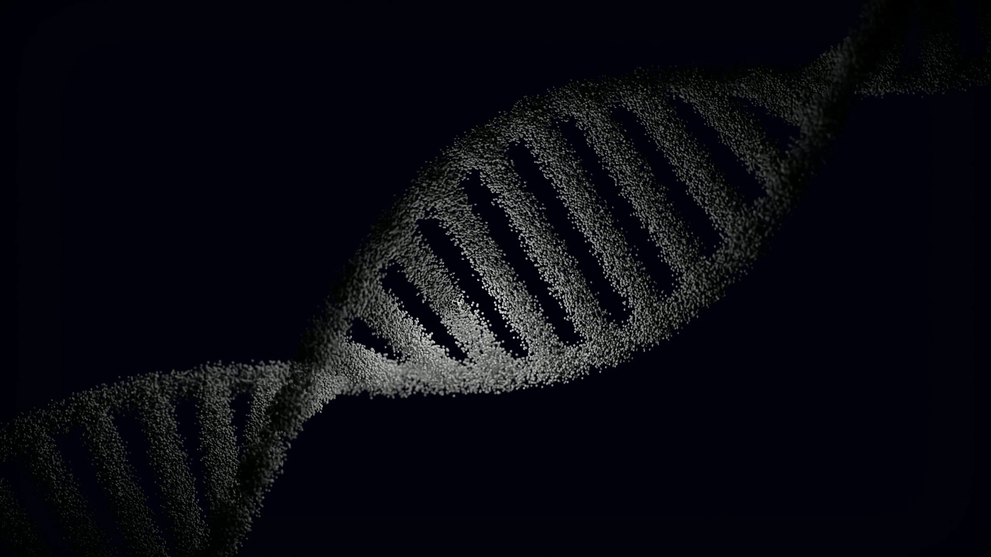 A digital rendering of a DNA sequence helix, appearing dark and textured against a black background, representing science.