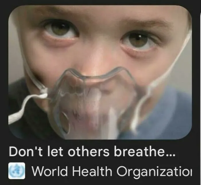 Close-up of a child wearing an oxygen mask, eyes wide. The image has a humorous caption about premature truncation.