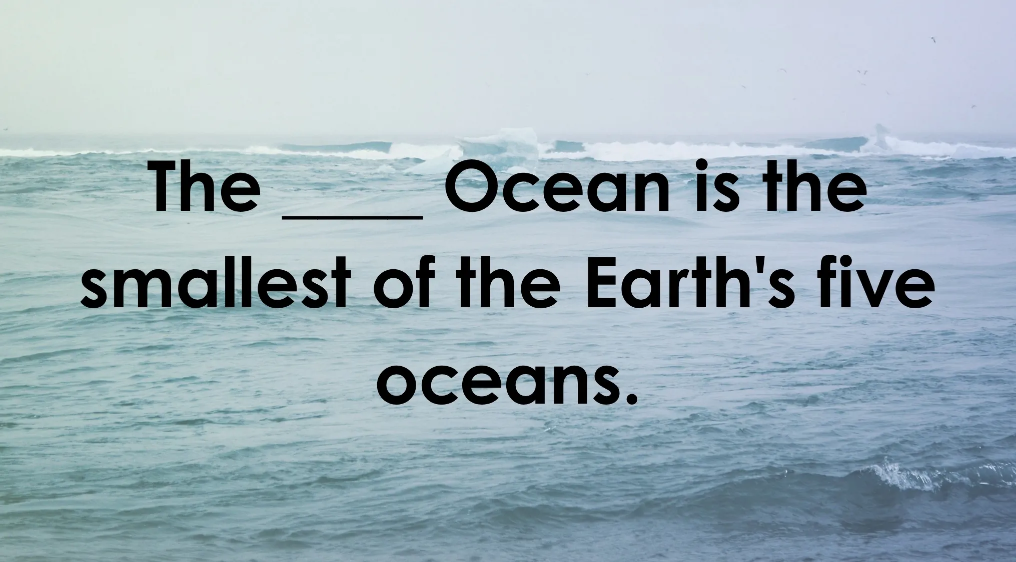 Science Type-In Trivia question: fill in the blank about the smallest ocean, with ocean waves in the background.