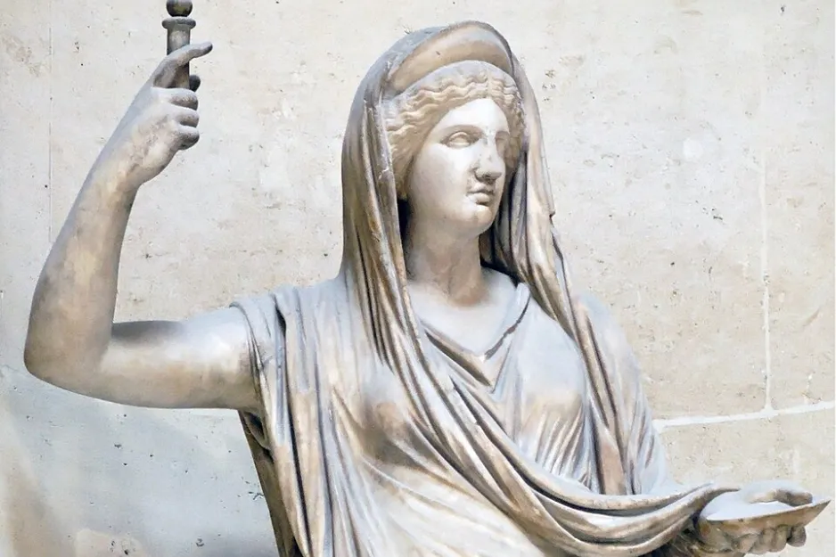 Marble statue of Hera, the Olympian messenger of the gods, draped in a toga and holding an object.