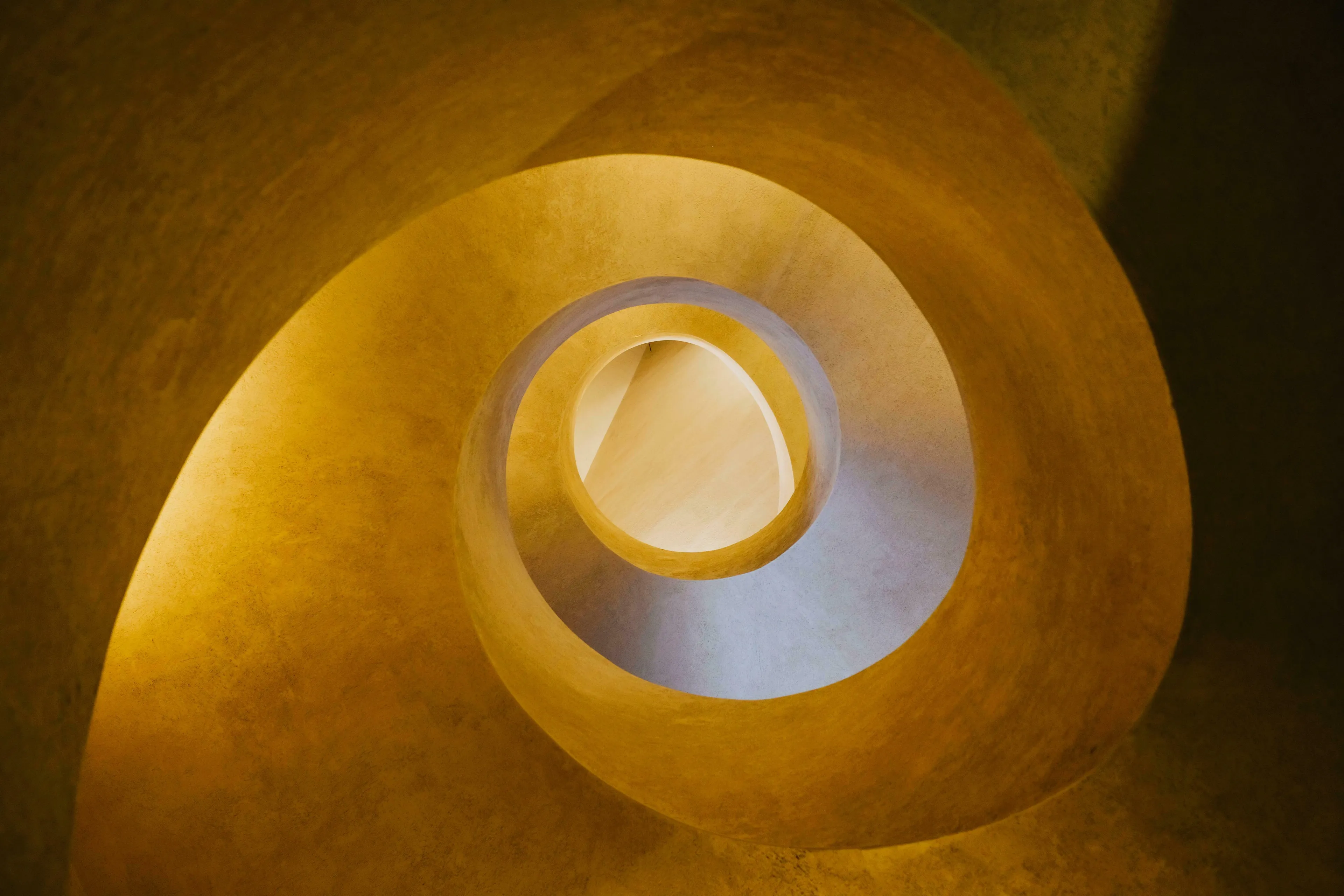 A golden spiral staircase from above, a visual example of the Golden Ratio. Perfect for a difficult general knowledge quiz.