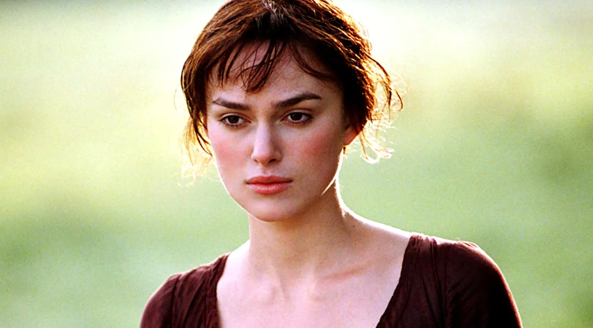 Keira Knightley, a celebrity, in a close-up, gazing thoughtfully. Spell celebrity names correctly.