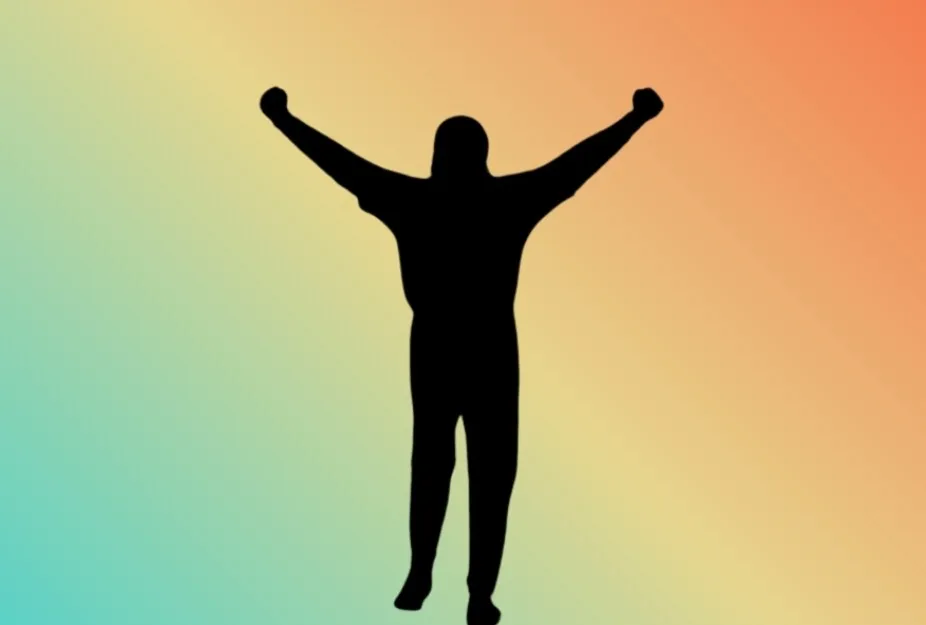 Silhouette of a person with arms raised in triumph, reminiscent of Rocky, against a colorful gradient background.