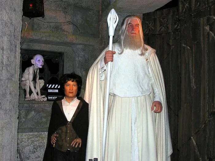 Wax figures of fantasy characters including Gandalf and Gollum in a themed celebrity wax figures setup