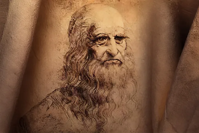 A sepia-toned sketch of Leonardo da Vinci, a historical figure, with a long beard and flowing hair, on textured paper.